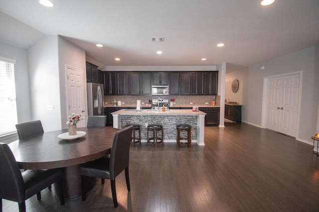 dining room featuring dark hardwood / wood-style floors