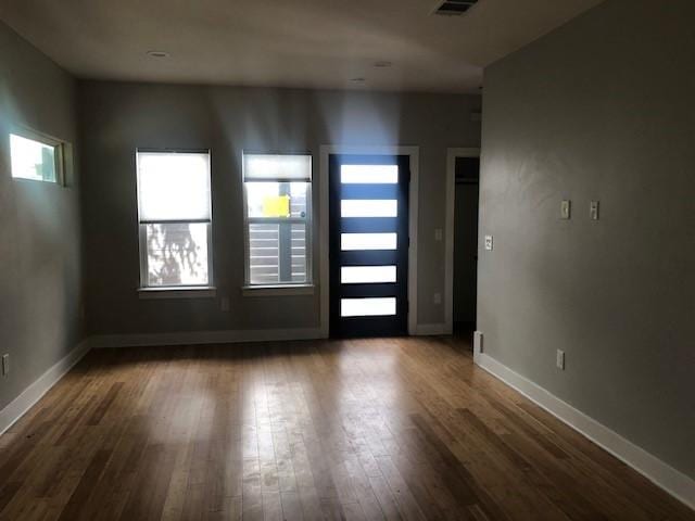 entryway featuring dark wood-type flooring