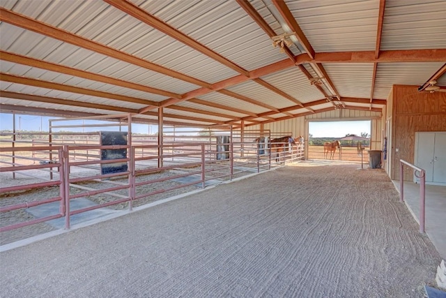 view of stable with a rural view