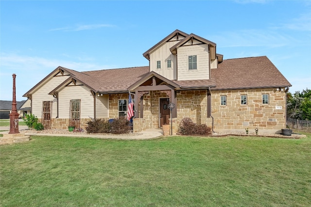 craftsman inspired home with a front lawn