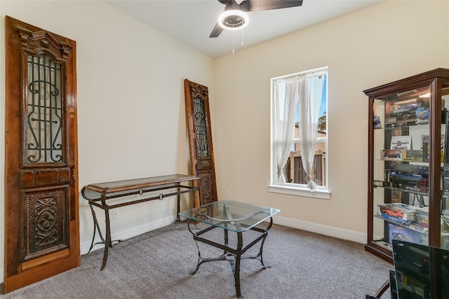 misc room featuring carpet and ceiling fan