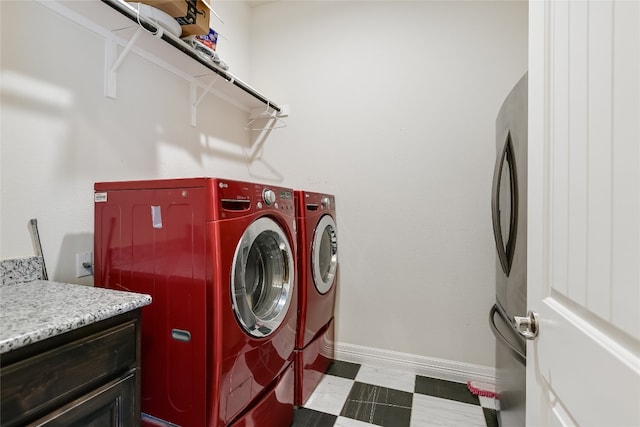 laundry room featuring independent washer and dryer