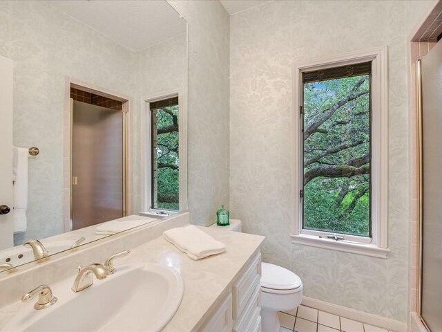3901 Prentice Ln, Austin, TX 78746 - full bathroom with tile patterned flooring, vanity, and wallpapered walls