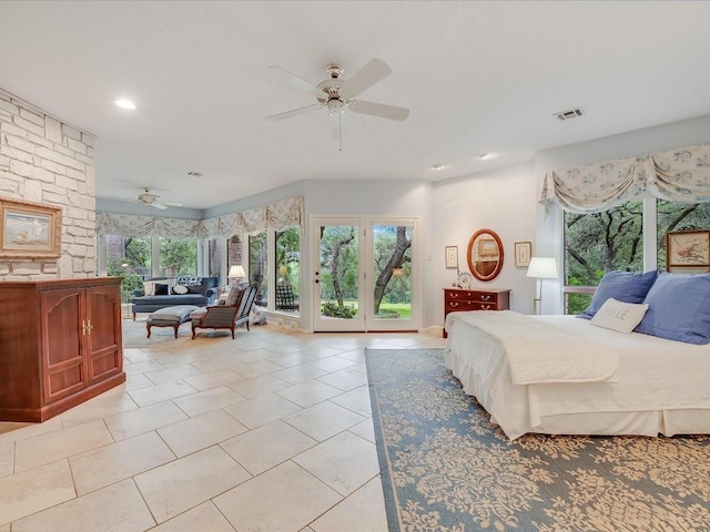 3901 Prentice Ln, Austin, TX 78746 - bedroom with access to outside, multiple windows, light tile patterned flooring, and recessed lighting
