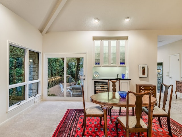 3901 Prentice Ln, Austin, TX 78746 - dining space with a bar, beverage cooler, beam ceiling, light colored carpet, and recessed lighting