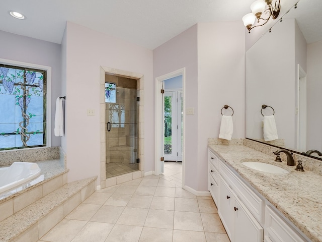 3901 Prentice Ln, Austin, TX 78746 - full bath with vanity, a stall shower, a bath, tile patterned flooring, and recessed lighting