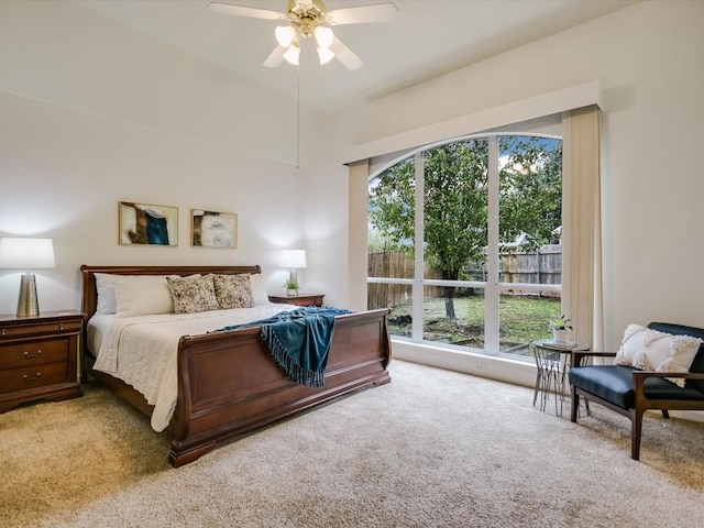 bedroom featuring ceiling fan and light colored carpet