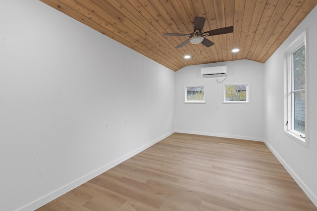 unfurnished room with vaulted ceiling, ceiling fan, light wood-type flooring, a wall mounted AC, and wood ceiling