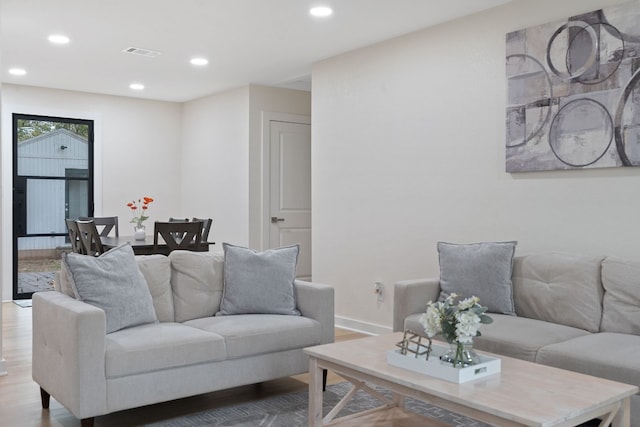 living room featuring light wood-type flooring