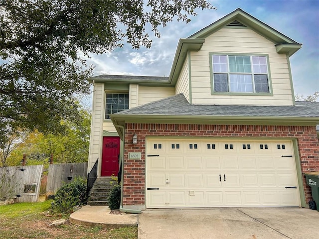 view of front of property featuring a garage