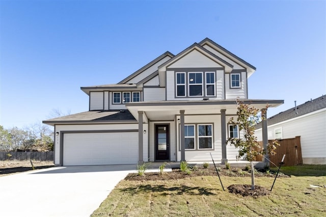 view of front facade with a garage and a front lawn