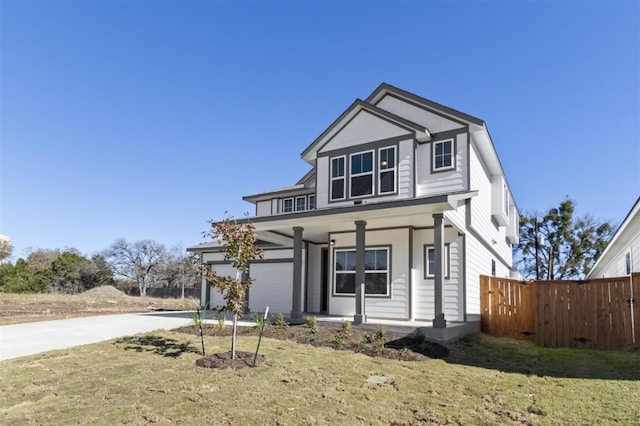 view of front of house with a porch and a front yard