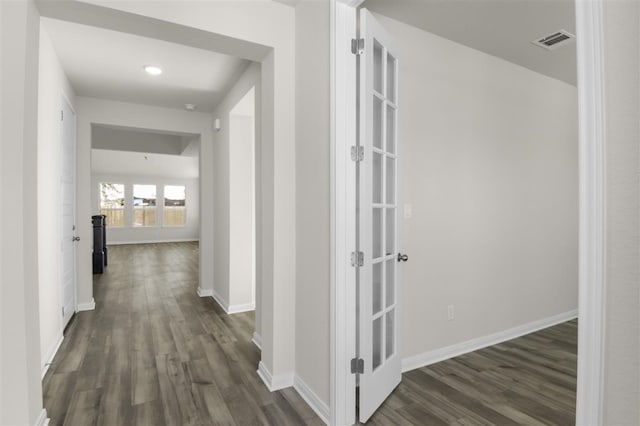 113 Wagon Spoke Way, Liberty Hill, TX 78642 - hallway with dark wood finished floors, baseboards, and recessed lighting