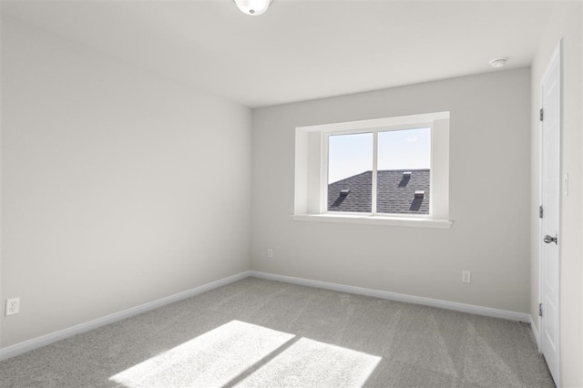 113 Wagon Spoke Way, Liberty Hill, TX 78642 - empty room featuring light carpet and a smoke detector