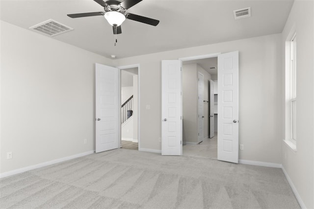 113 Wagon Spoke Way, Liberty Hill, TX 78642 - unfurnished bedroom featuring carpet and ceiling fan