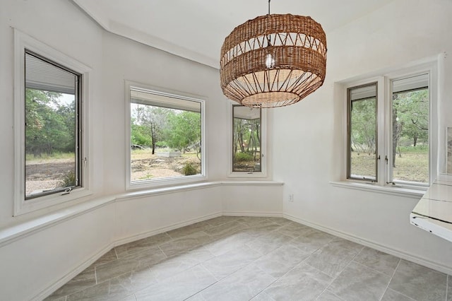 unfurnished sunroom with plenty of natural light