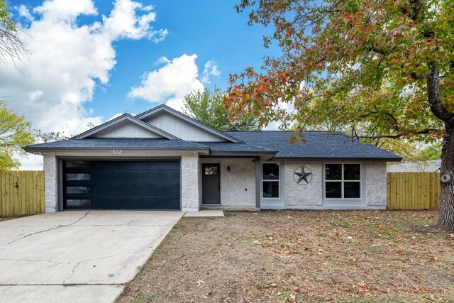 ranch-style house with a garage