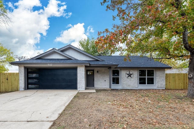 single story home with a garage