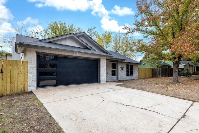 ranch-style home with a garage