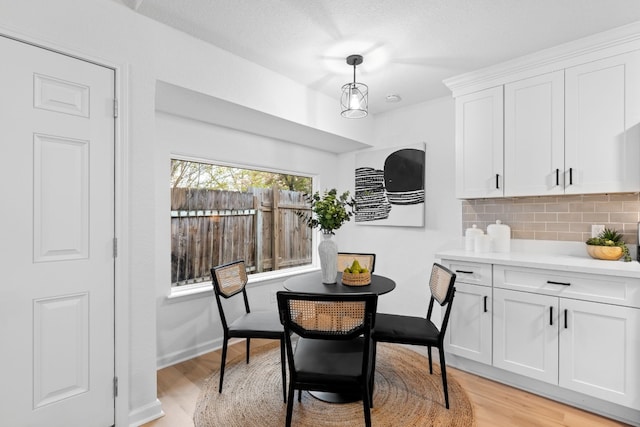 dining room with light hardwood / wood-style floors