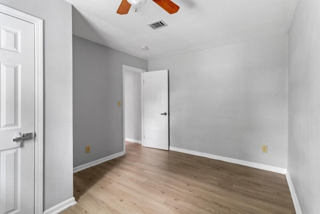 unfurnished bedroom featuring light wood-type flooring and ceiling fan