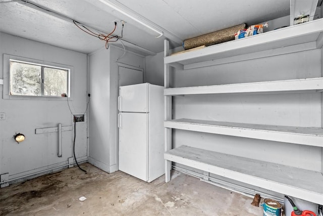 interior space featuring white fridge