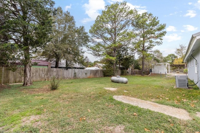 view of yard with central AC