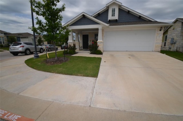 craftsman-style home with a front lawn