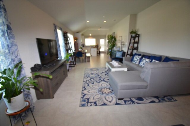 living room with lofted ceiling