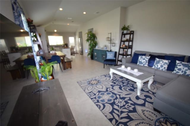 living room with vaulted ceiling