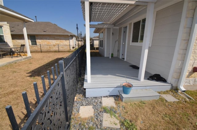 exterior space featuring a fenced backyard and a pergola