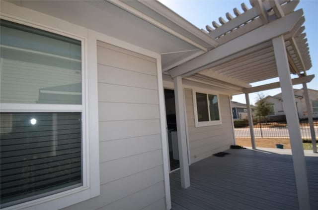 wooden terrace featuring a pergola