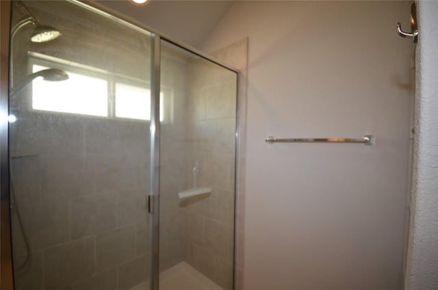 bathroom with a stall shower