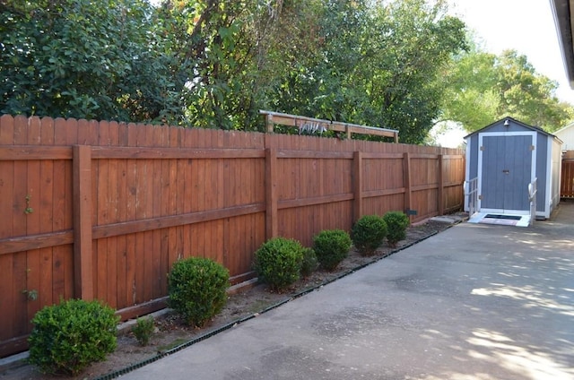 exterior space featuring a storage unit