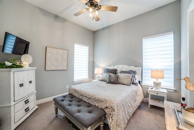 bedroom with ceiling fan and carpet flooring