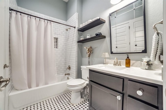 full bathroom featuring vanity, toilet, and shower / bathtub combination with curtain