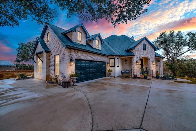 view of front of home with a garage