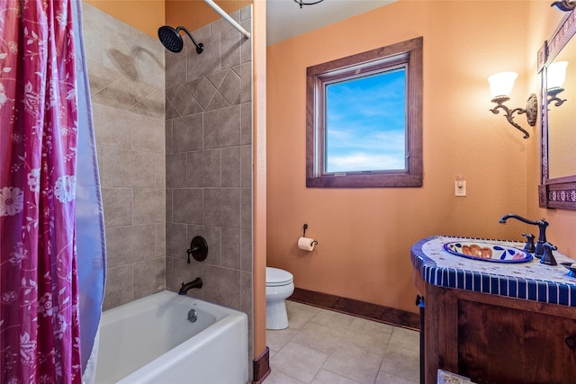 full bathroom with vanity, tile patterned floors, toilet, and shower / bath combo