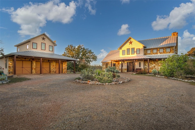 farmhouse-style home featuring a garage