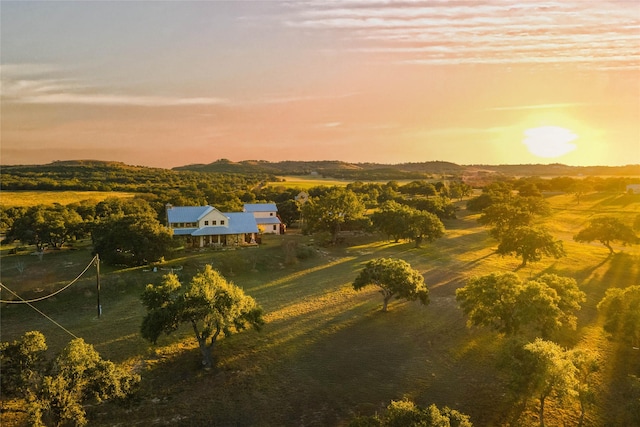 aerial view at dusk with a rural view