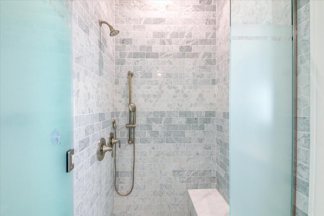 bathroom featuring an enclosed shower