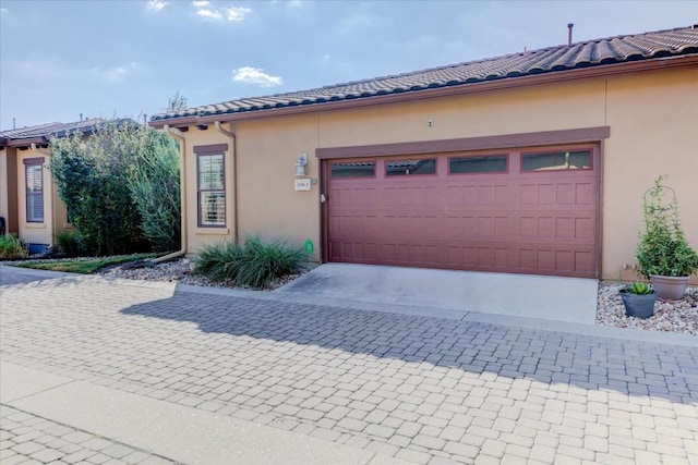 exterior space with a garage