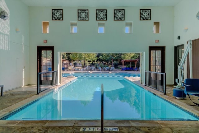 view of swimming pool with a patio