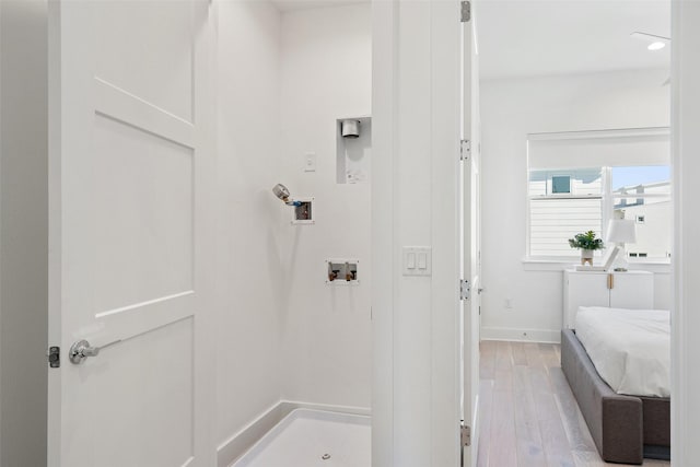 bathroom featuring hardwood / wood-style flooring