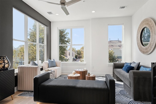 interior space featuring ceiling fan and light hardwood / wood-style flooring