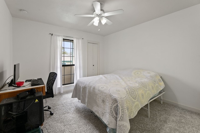 bedroom with carpet flooring, a closet, and ceiling fan