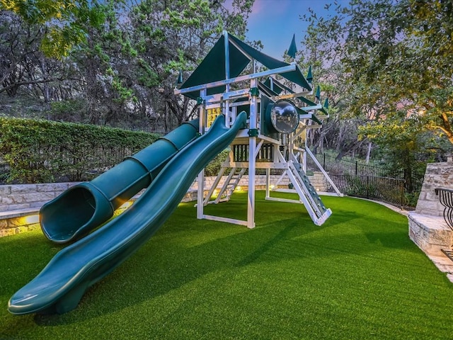 view of jungle gym featuring a yard