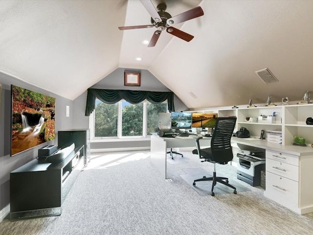 office area with ceiling fan, light colored carpet, and lofted ceiling