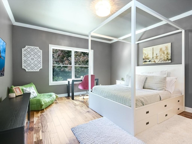 3001 Pescadero Cv, Austin, TX 78746 - bedroom featuring crown molding, wood finished floors, and baseboards