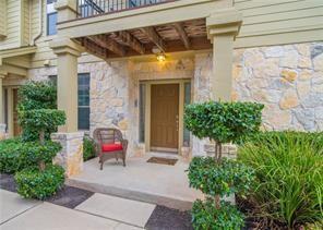 entrance to property with a balcony